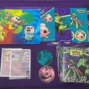 Pokémon Collector Chest stickers, coins, promo cards and mini binder
